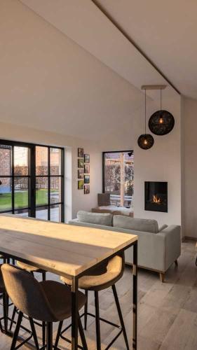 Aluminium-ramen-bijgebouw-in-houtskelet-zelf-geplaatst-begeleid-zelfbouwpakket-houtskeletbouw (1)