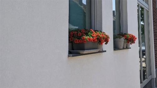 Klantgetuigenis-aanbouw-woning-houtskeletbouw-pellenberg-skeletbouw-uitbouw-renovatie-renoavtiewerken-leuven