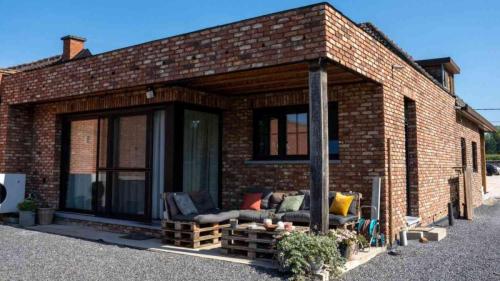 aanbouw-houtskeletbouw-wellen-uitbouw-achtergevel-steenstrips-limburg-skeletbouw-belgie