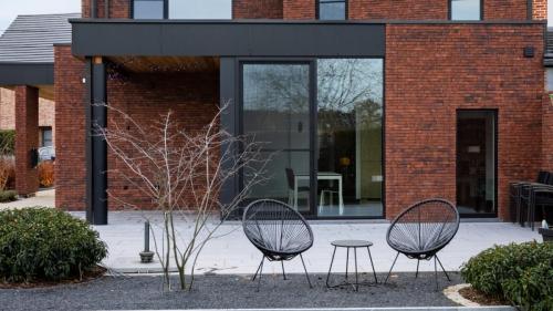 optopping-houtskeletbouw-hasselt-halfopen-woning-renovatie-houtskelet-belgie